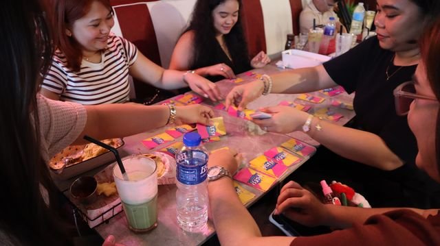 Team members crafting together at the Davao meetup